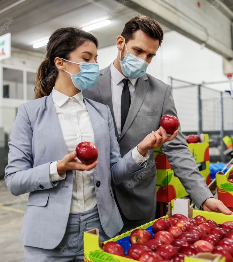 fruit-apple-inspection-by-management-company-man-woman-wear-elegant-suits-protective-face-masks-while-standing-process-making-apples-fruit-quality-check-factory_232070-12533-1.jpg